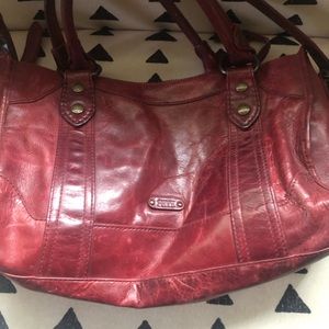 Frye red leather purse barely used .